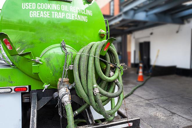 grease trap being pumped at a restaurant kitchen in Highwood